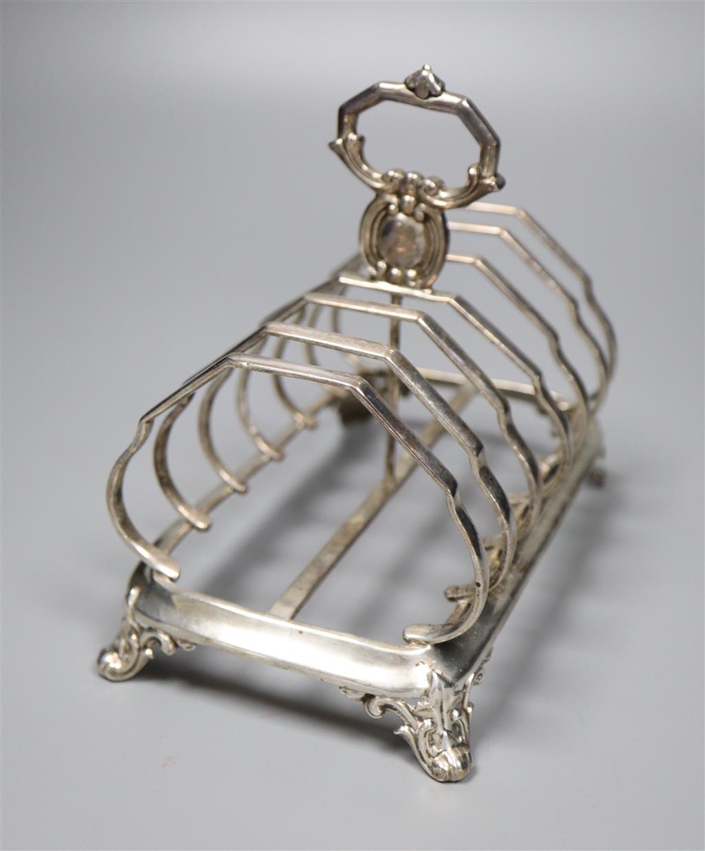 A Victorian silver six-division toast rack, George Angell & Co, London, 1853, length 16.3cm, 10oz.